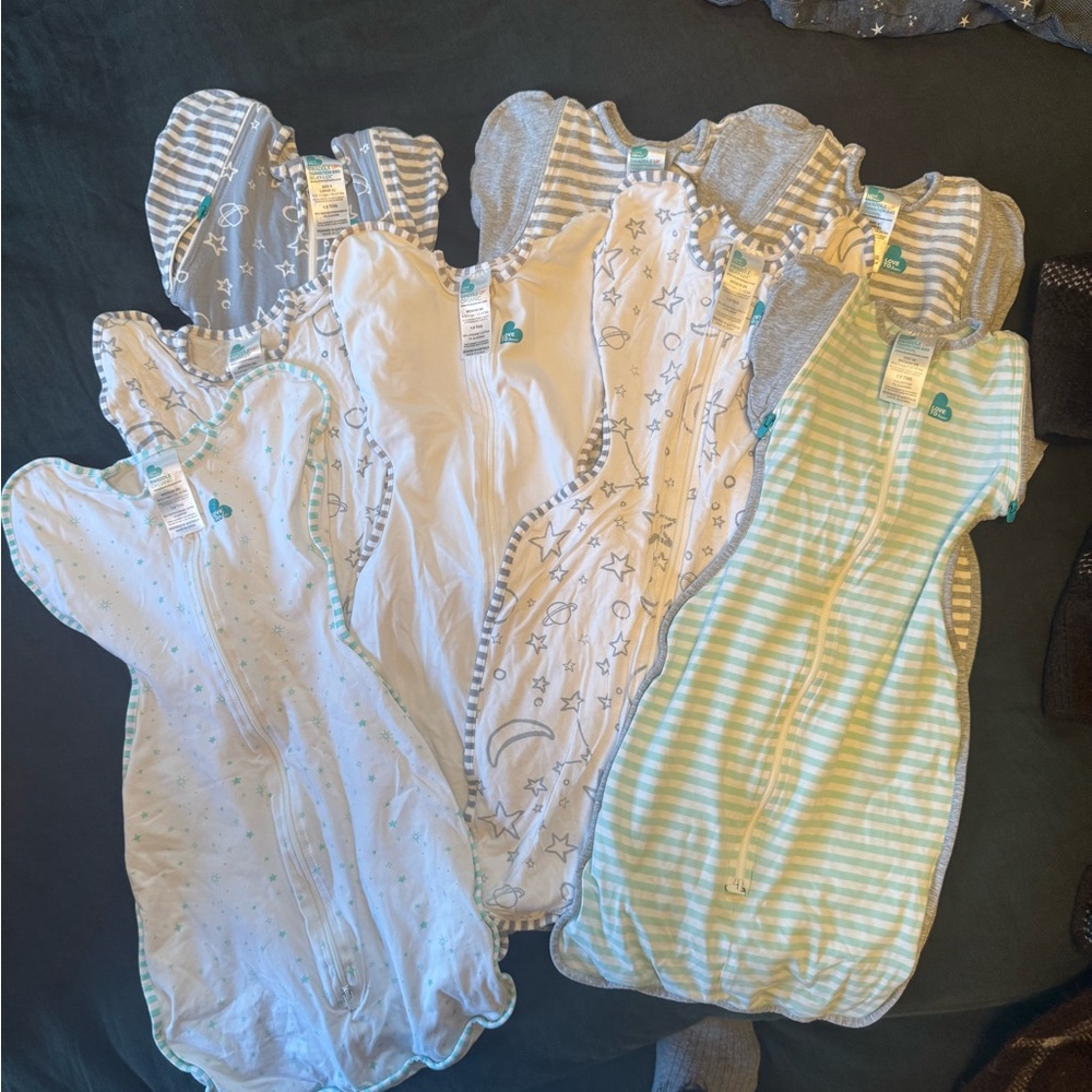 5 Medium and 3 Large Love to Dream Swaddle Up Sacks